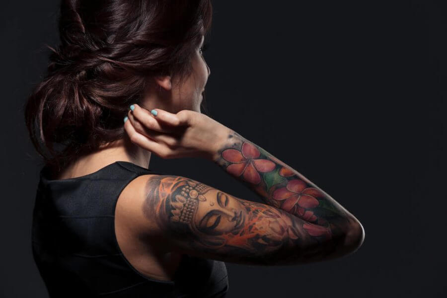 woman with tattooed hand